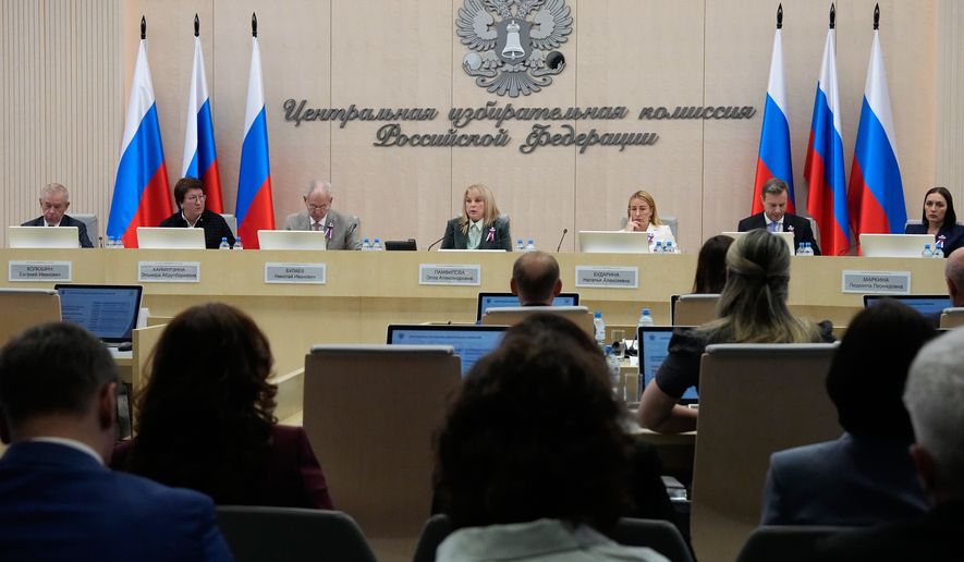 Ella Pamfilova, head of Russia's Central Election Commission, center, reports the official results of Russia's parliamentary elections at the commission's meeting in Moscow, Russia, Friday, Sept. 25, 2026. (AP Photo/Alexander Zemlianichenko)