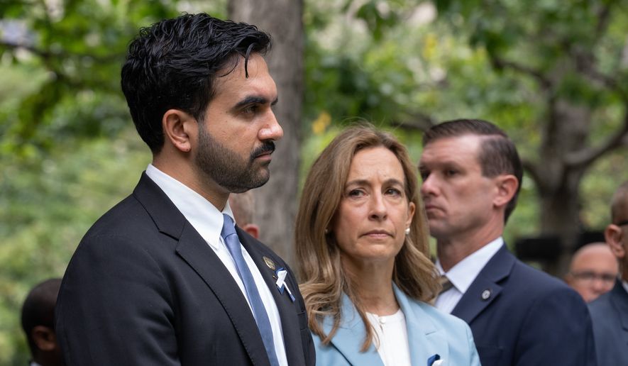 New York City Mayor Zohran Mamdani and New Jersey Gov. Mikie Sherrill attend the ceremony commemorating the 25th anniversary of the Sept. 11, 2001, attacks at the National September 11 Memorial in New York on Friday, Sept. 11, 2026. (Barry Williams /The Daily News via AP, Pool)