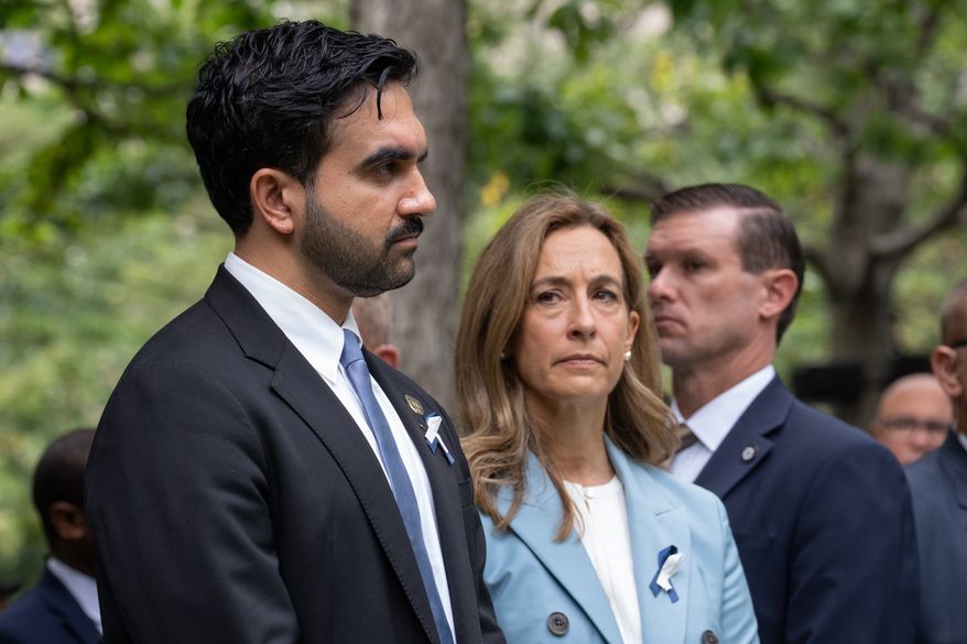 New York City Mayor Zohran Mamdani and New Jersey Gov. Mikie Sherrill attend the ceremony commemorating the 25th anniversary of the Sept. 11, 2001, attacks at the National September 11 Memorial in New York on Friday, Sept. 11, 2026. (Barry Williams /The Daily News via AP, Pool)