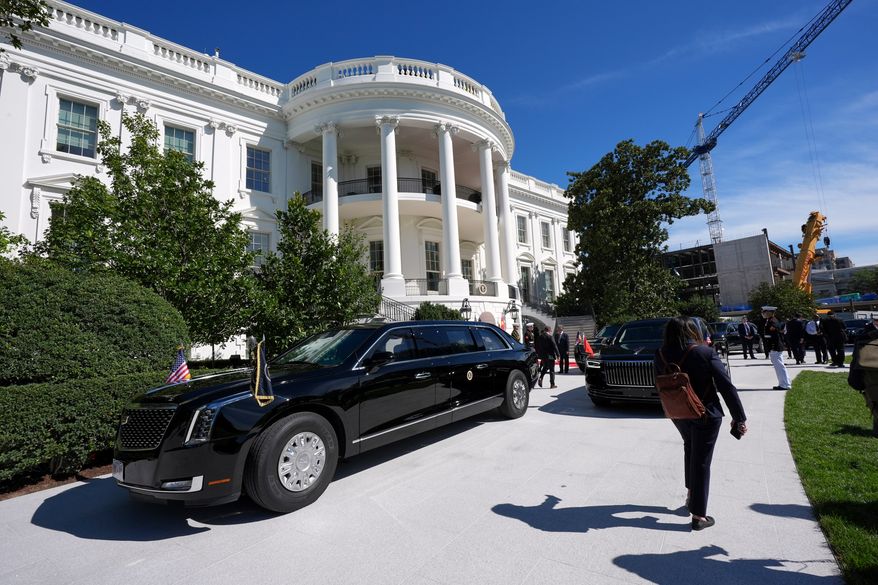 The motorcade of President Donald Trump departs the White House en route to the National Archives to greet China's President Xi Jinping and his wife Peng Liyuan, Friday, Sept. 25, 2026, in Washington. (AP Photo/Jacquelyn Martin)