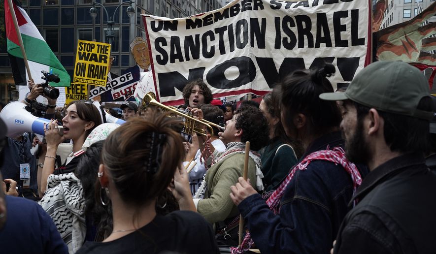 Demonstrators gather to protest following Israeli Prime Minister Benjamin Netanyahu's address at the 81st session of the United Nations General Assembly, Thursday, Sept. 24, 2026, in New York. (AP Photo/Madison Swart)