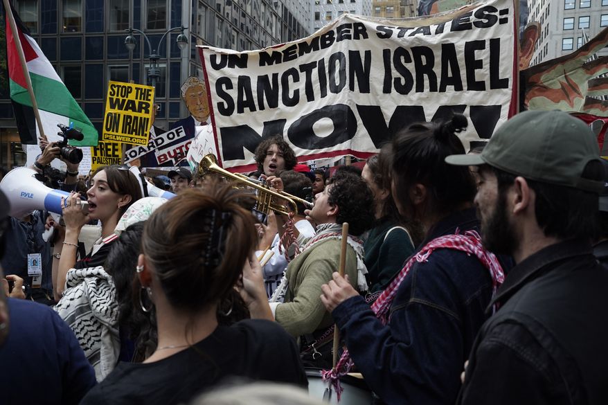 Demonstrators gather to protest following Israeli Prime Minister Benjamin Netanyahu's address at the 81st session of the United Nations General Assembly, Thursday, Sept. 24, 2026, in New York. (AP Photo/Madison Swart)