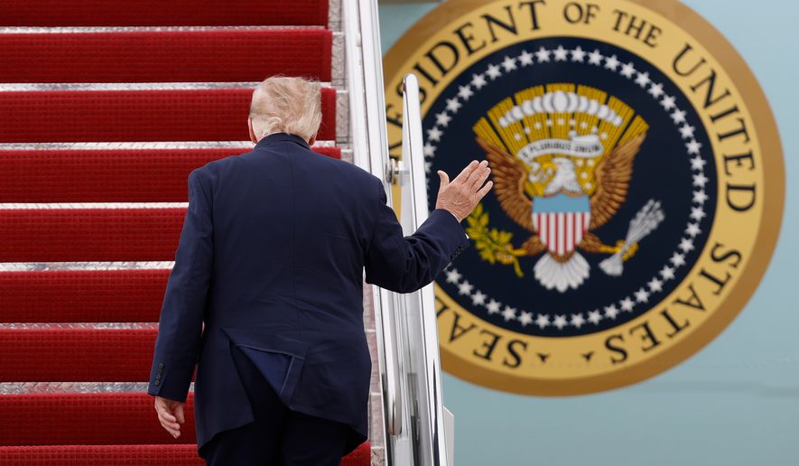 President Donald Trump walks up the stairs of Air Force One upon his departure at Joint Base Andrews, Md., Saturday, Sept. 26, 2026, en route to watch the Texas versus Tennessee NCAA college football game in Knoxville, Tenn. (AP Photo/Luis M. Alvarez)