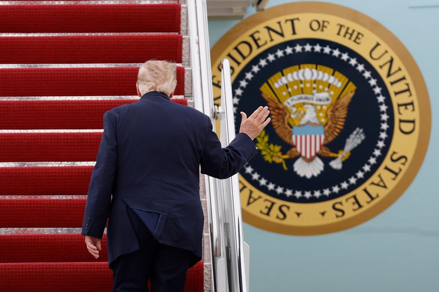 President Donald Trump walks up the stairs of Air Force One upon his departure at Joint Base Andrews, Md., Saturday, Sept. 26, 2026, en route to watch the Texas versus Tennessee NCAA college football game in Knoxville, Tenn. (AP Photo/Luis M. Alvarez)