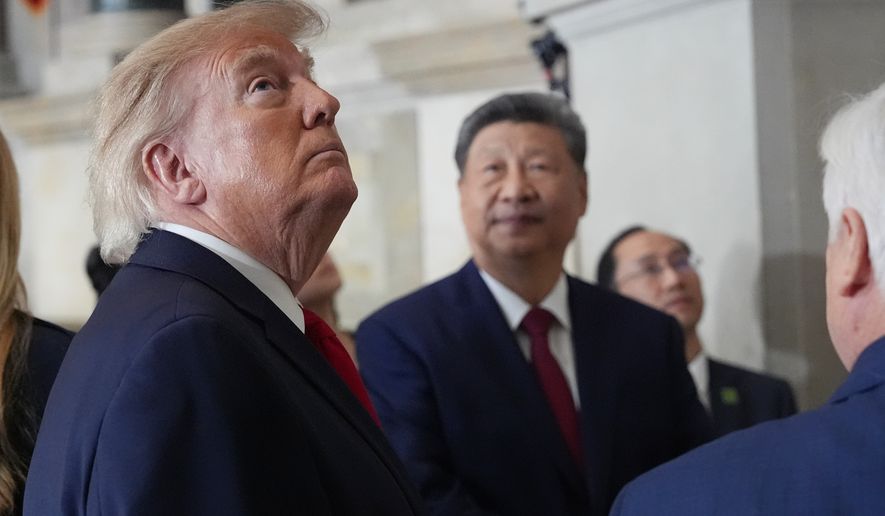 President Donald Trump, China's President Xi Jinping with Bradford Wilson, Archivist of the United States, tour the National Archives, Friday, Sept. 25, 2026, in Washington. (AP Photo/Alex Brandon)