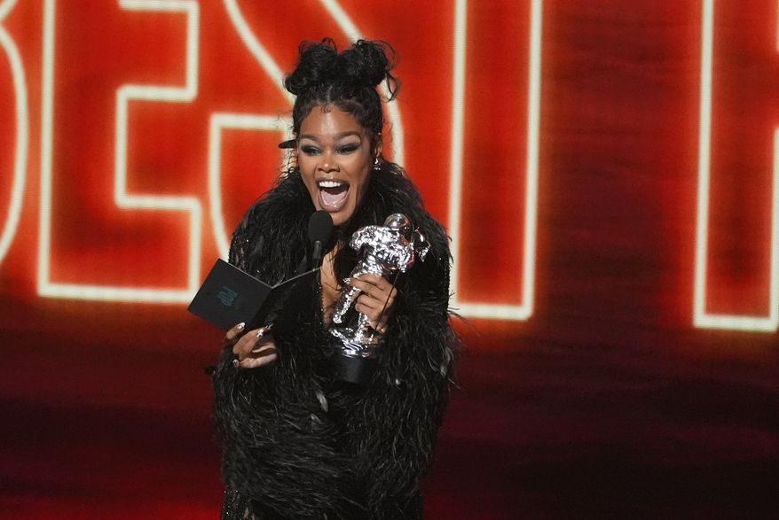 Teyana Taylor presents the award for best pop during the MTV Video Music Awards on Sunday, Sept. 27, 2026, at the Peacock Theater in Los Angeles. (AP Photo/Chris Pizzello)