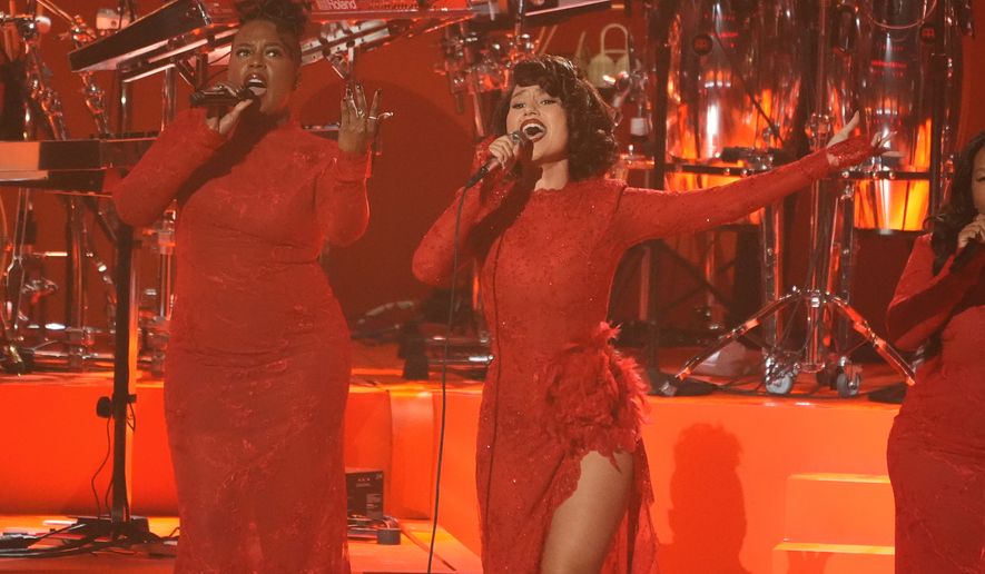 RAYE, center, performs "Where is my husband!!" during the MTV Video Music Awards on Sunday, Sept. 27, 2026, at the Peacock Theater in Los Angeles. (AP Photo/Chris Pizzello)