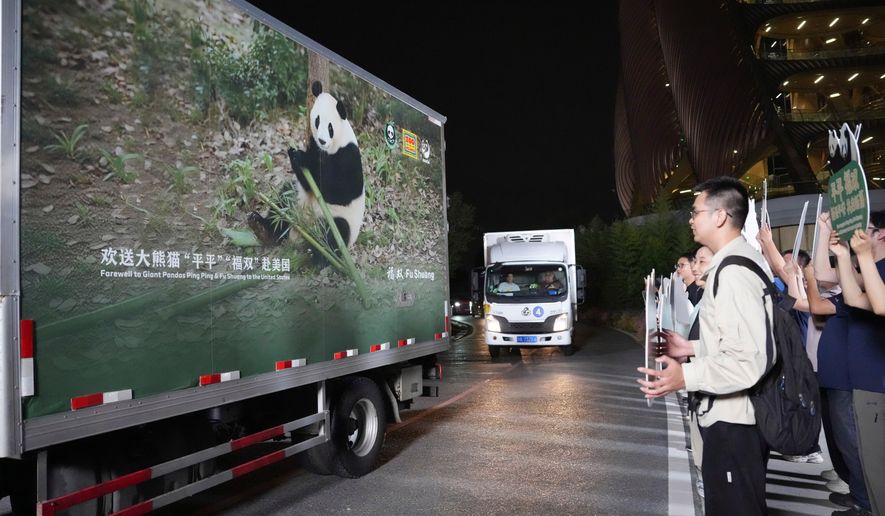 In this photo released by Xinhua News Agency, vehicles carrying a pair of giant pandas, Ping Ping and Fu Shuang, leave the Chengdu Research Base of Giant Panda Breeding in Chengdu, southwestern China's Sichuan Province, Saturday, Sept. 26, 2026.(Xu Bingjie/Xinhua via AP)
