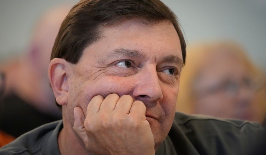 Troy Jackson, Democratic candidate for U.S. Senate, listens to a speaker at the Southern Maine Labor Council breakfast, Monday, Sept. 7, 2026, in South Portland, Maine. (AP Photo/Robert F. Bukaty)