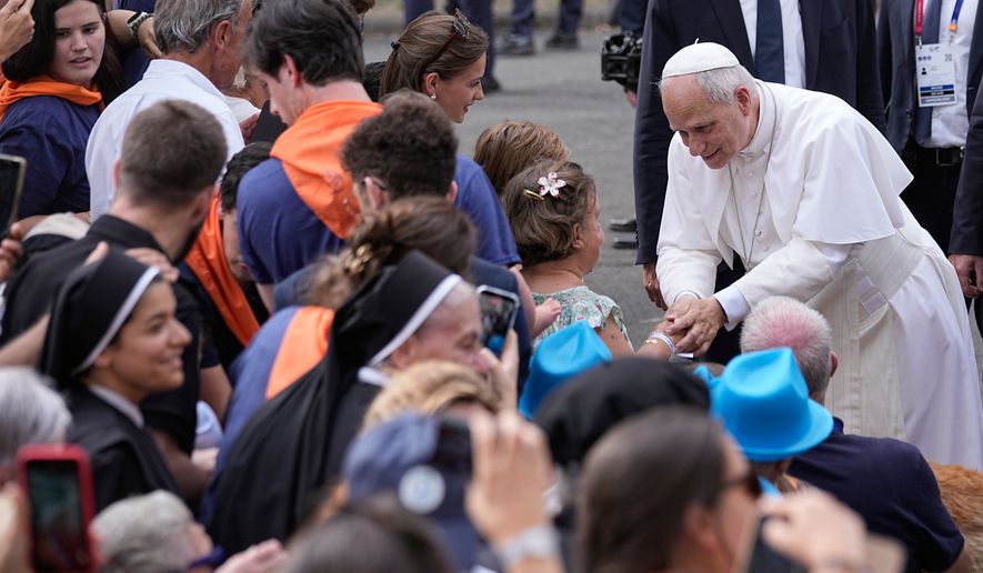 Pope Leo XIV meets with staff and guests of Accueil Notre-Dame and sick people at the Sanctuary of Our Lady of Lourdes, France, Sunday, Sept. 27, 2026. (AP Photo/Laurent Cipriani)