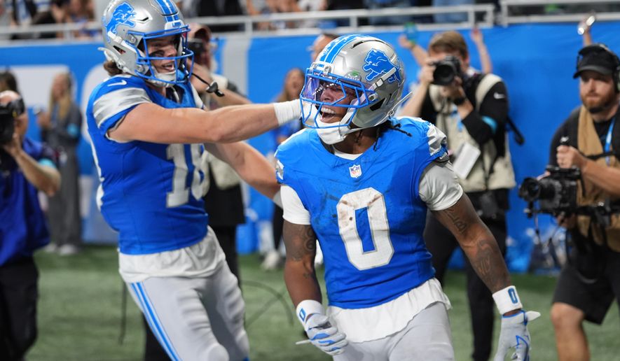 Detroit Lions' Jahmyr Gibbs celebrates his touchdown run during the second half of an NFL football game against the New York Jets in Detroit, Sunday, Sept. 27, 2026. (AP Photo/Paul Sancya)