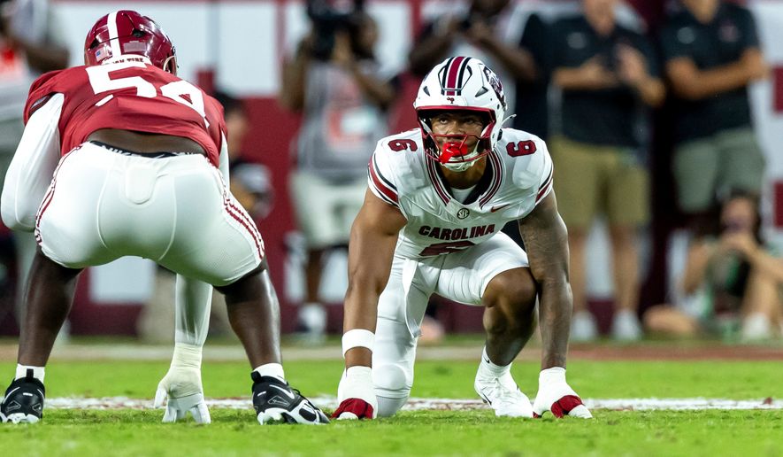 FILE - South Carolina defensive end Dylan Stewart (6) lines up against Alabama during the first half of an NCAA college football game, Sept. 26, 2026, in Tuscaloosa, Ala. (AP Photo/Vasha Hunt, File)