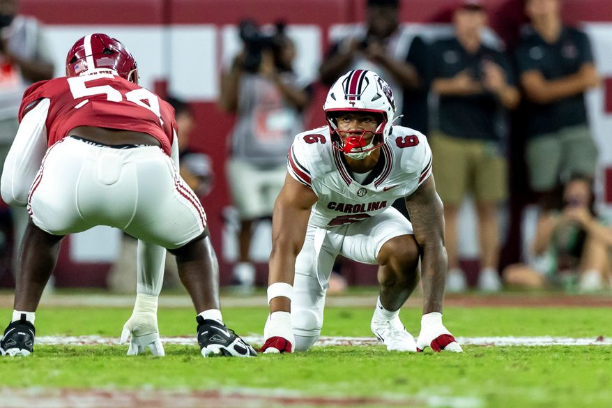 FILE - South Carolina defensive end Dylan Stewart (6) lines up against Alabama during the first half of an NCAA college football game, Sept. 26, 2026, in Tuscaloosa, Ala. (AP Photo/Vasha Hunt, File)
