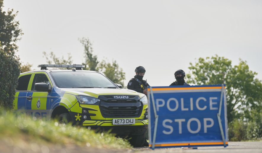 Police guard a road leading to RAF Fairford, in Fairford, England, Monday, Sept. 28, 2026. (AP/Alastair Grant)