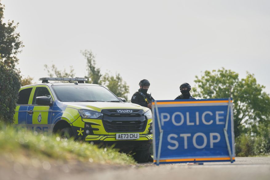 Police guard a road leading to RAF Fairford, in Fairford, England, Monday, Sept. 28, 2026. (AP/Alastair Grant)