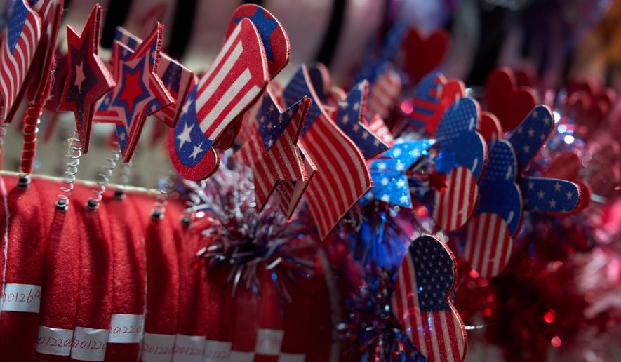 U.S. flag themed wearables are displayed at the Yiwu International Trade Market in Yiwu, eastern China's Zhejiang province, on April 10, 2025. (AP Photo/Ng Han Guan, File)