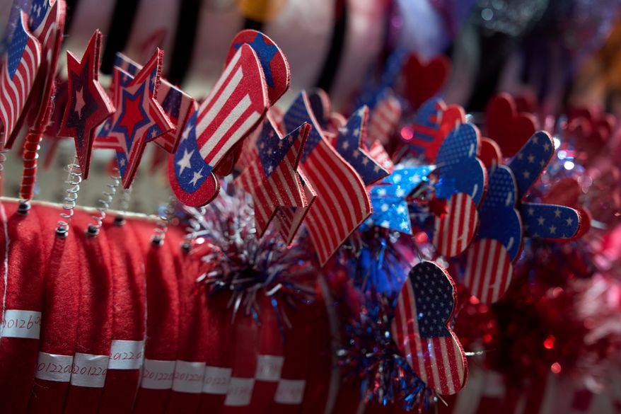U.S. flag themed wearables are displayed at the Yiwu International Trade Market in Yiwu, eastern China's Zhejiang province, on April 10, 2025. (AP Photo/Ng Han Guan, File)