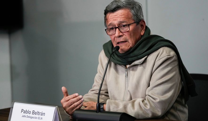 FILE - Pablo Beltrán, commander and chief negotiator for the National Liberation Army, ELN, rebel group speaks during a joint news conference with Jose Otty Patiño, chief negotiator for the Colombian government, as a part of the peace talks between both parties in Bogota, Colombia, Oct. 10, 2023. (AP Photo/Fernando Vergara, File)