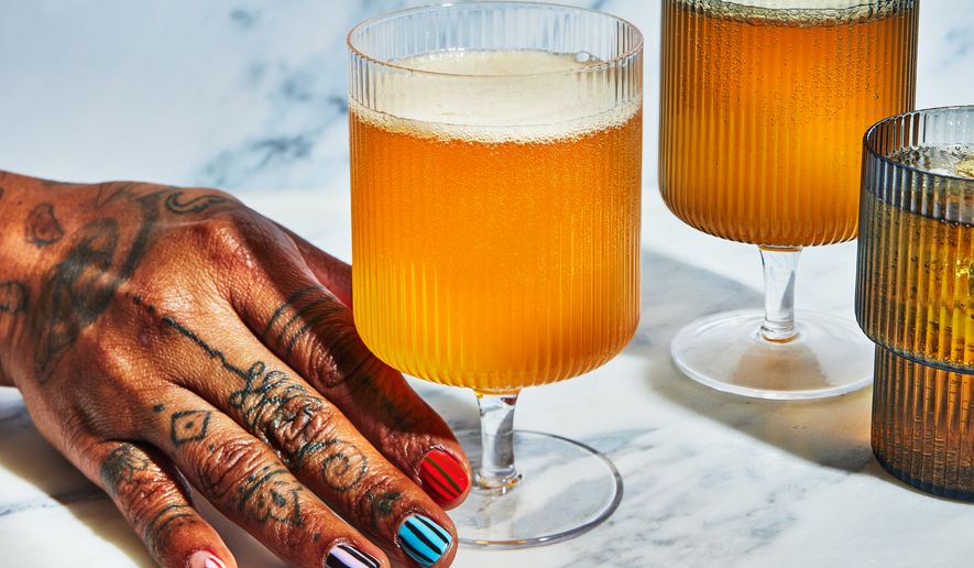 This image released by Voracious shows a cider cocktail recipe from the book "Good Spirits" by Tiffanie Barriere. (Caitlin Bensel/Voracious via AP)