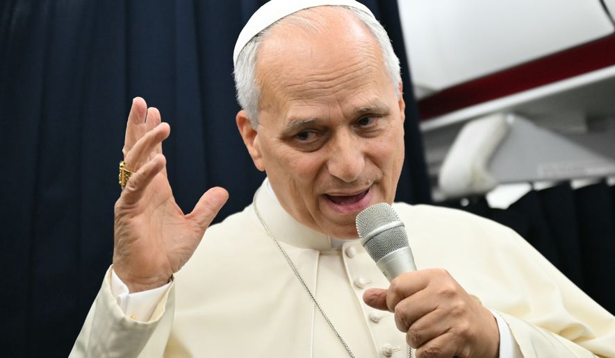 Pope Leo XIV speaks to journalists aboard the flight from Metz, France, to Rome, at the end of his four-day visit to France, Monday, Sept. 28, 2026. (Alberto Pizzoli/Pool Photo via AP)