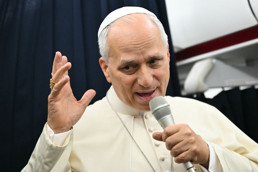 Pope Leo XIV speaks to journalists aboard the flight from Metz, France, to Rome, at the end of his four-day visit to France, Monday, Sept. 28, 2026. (Alberto Pizzoli/Pool Photo via AP)