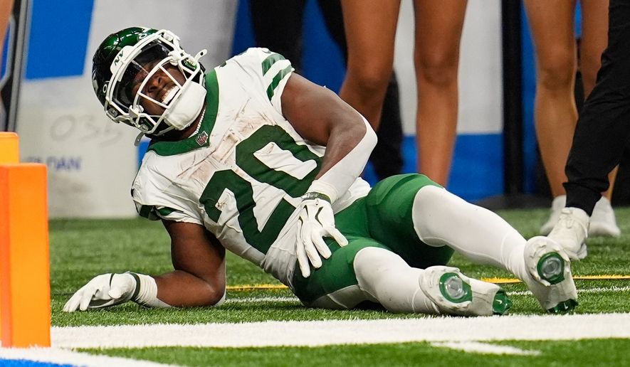 New York Jets' Breece Hall is injured during the second half of an NFL football game against the Detroit Lions in Detroit, Sunday, Sept. 27, 2026. (AP Photo/Paul Sancya)
