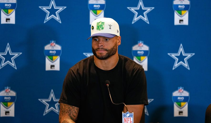 Dallas Cowboys quarterback Dak Prescott speaks during a press conference after an NFL football game against the Baltimore Ravens in Rio de Janeiro, Sunday, Sept. 27, 2026. (AP Photo/Fernando Llano)