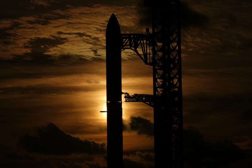 The sun set behind SpaceX's mega rocket Starship as it is prepared for a test flight from Starbase, Texas, Sunday, Sept. 27, 2026. (AP Photo/Eric Gay)