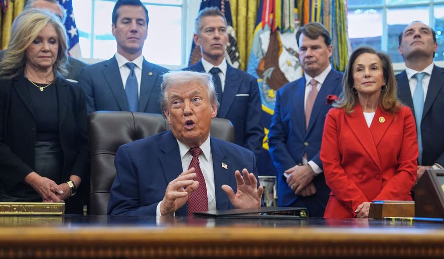 President Donald Trump speaks during an event on fuel economy standards in the Oval Office of the White House, Dec. 3, 2025, in Washington. (AP Photo/Evan Vucci, File)
