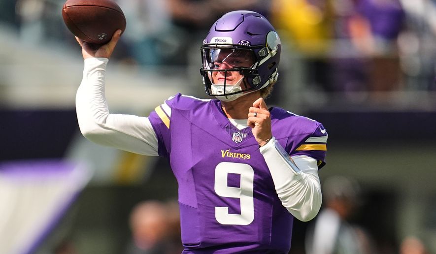 FILE - Minnesota Vikings quarterback J.J. McCarthy (9) warms up before an NFL preseason football game against the Baltimore Ravens, Aug. 22, 2026, in Minneapolis. (AP Photo/Abbie Parr, File)