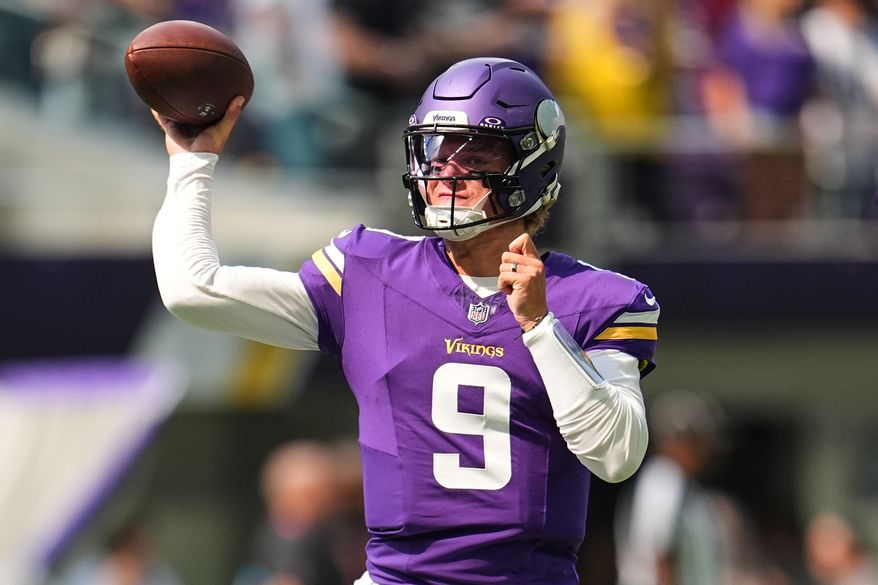 FILE - Minnesota Vikings quarterback J.J. McCarthy (9) warms up before an NFL preseason football game against the Baltimore Ravens, Aug. 22, 2026, in Minneapolis. (AP Photo/Abbie Parr, File)