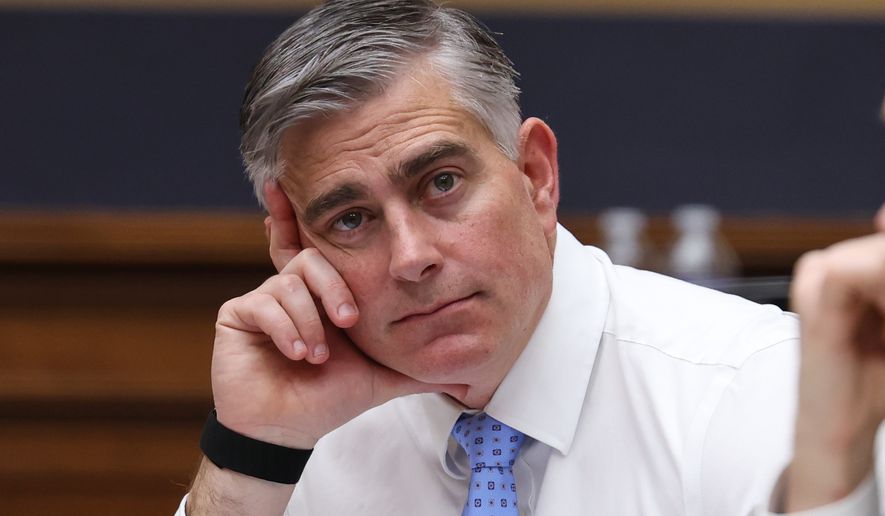 Michael Baumgartner, R-Wash., listens as Attorney General Pam Bondi testifies before a House Judiciary Committee oversight hearing on Capitol Hill in Washington, Wednesday, Feb. 11, 2026, in Washington. (AP Photo/Tom Brenner)