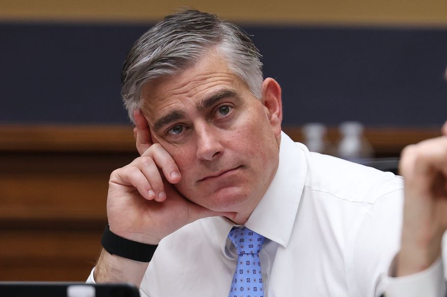 Michael Baumgartner, R-Wash., listens as Attorney General Pam Bondi testifies before a House Judiciary Committee oversight hearing on Capitol Hill in Washington, Wednesday, Feb. 11, 2026, in Washington. (AP Photo/Tom Brenner)