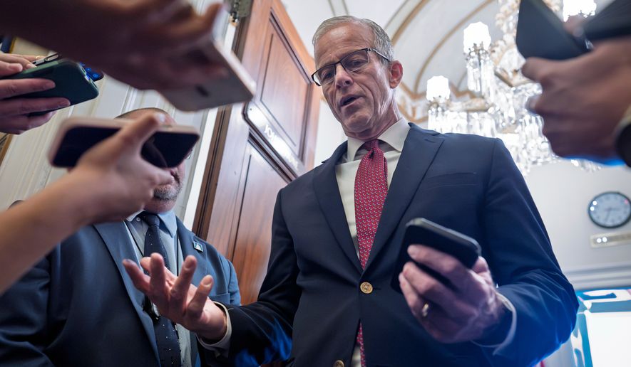 Majority Leader John Thune, R-S.D., speaks with reporters as he enters his office at the Capitol in Washington, Monday, Sept. 28, 2026. (AP Photo/J. Scott Applewhite)