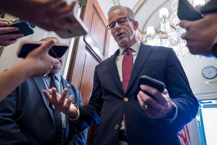 Majority Leader John Thune, R-S.D., speaks with reporters as he enters his office at the Capitol in Washington, Monday, Sept. 28, 2026. (AP Photo/J. Scott Applewhite)