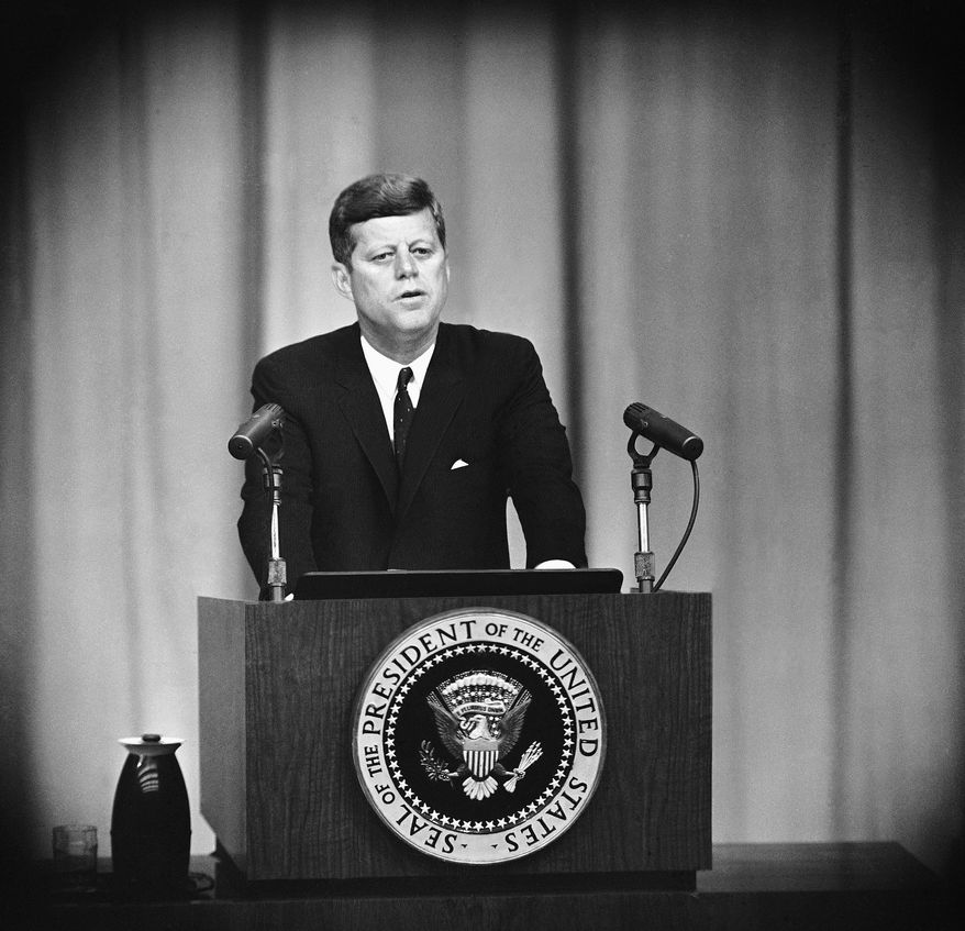 President John F. Kennedy opens at a Washington news conference on Sept. 13, 1962, with a lengthy statement on the Cuban situation. The president declared the United States will be “alert and fully capable” to deal with any offensive threat from Soviet-backed Cuba against the United States or any country in this hemisphere. (AP Photo)