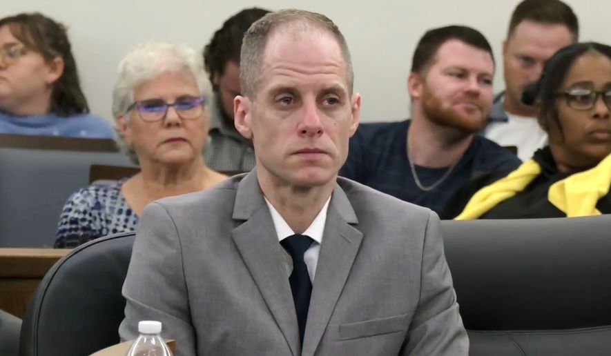 This image taken from pool court video shows 40-year-old Caleb Flynn listening to the judge reading out the jury's verdict at the Miami County Court of Common Pleas on Tuesday, Sept. 29, 2026, in Troy, Ohio. (Pool via AP)