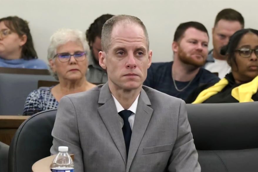 This image taken from pool court video shows 40-year-old Caleb Flynn listening to the judge reading out the jury's verdict at the Miami County Court of Common Pleas on Tuesday, Sept. 29, 2026, in Troy, Ohio. (Pool via AP)