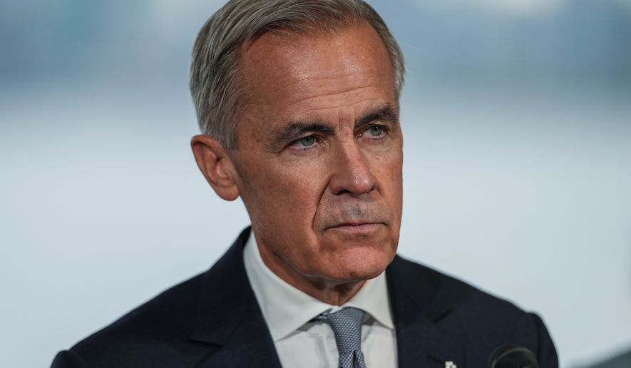 Canadian Prime Minister Mark Carney listens during an announcement about funding for oceans protection, in North Vancouver, British Columbia, Tuesday, Sept. 29, 2026. (Darryl Dyck/The Canadian Press via AP)