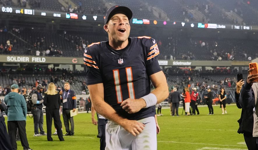 Chicago Bears quarterback Case Keenum celebrates the team's win after an NFL football game against the Philadelphia Eagles in Chicago, Monday, Sept. 28, 2026. (AP Photo/Nam Y. Huh)