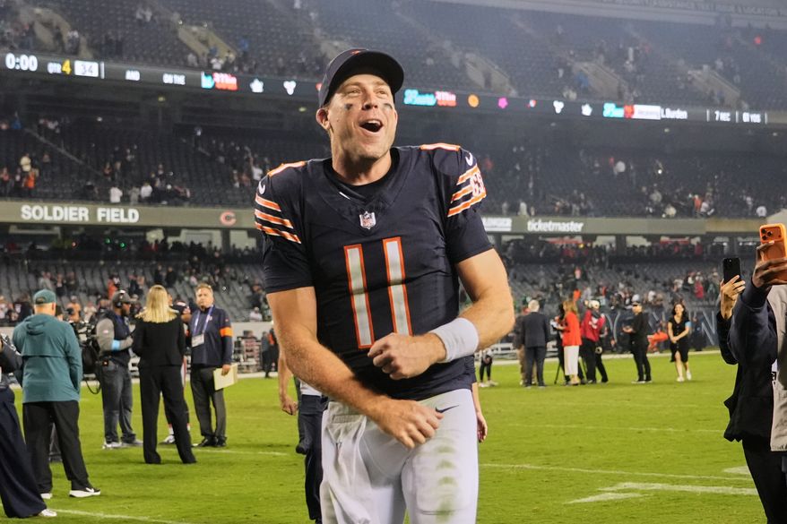 Chicago Bears quarterback Case Keenum celebrates the team's win after an NFL football game against the Philadelphia Eagles in Chicago, Monday, Sept. 28, 2026. (AP Photo/Nam Y. Huh)