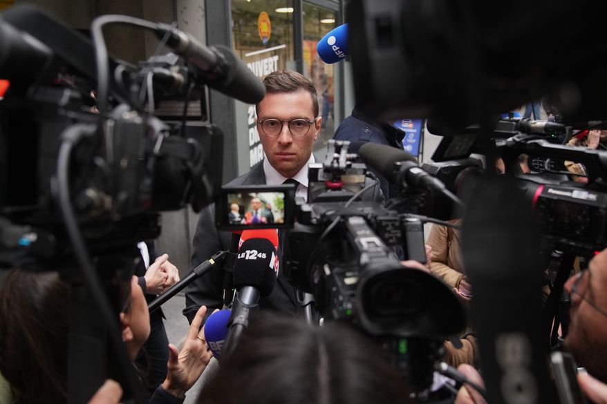 FILE - French far right National Rally party president Jordan Bardella answers reporters following a meeting, on Monday, Oct. 6, 2025 in Paris. (AP Photo/Christophe Ena, File)