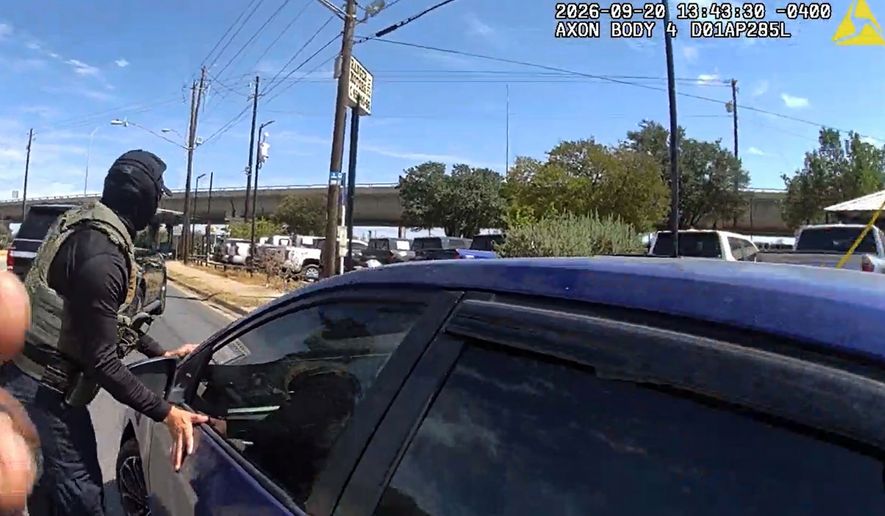 This image made from Immigration and Customs Enforcement (ICE) body camera footage shows an ICE officer stopping Wilber Rafael Garces Perez on Sunday, Sept. 20, 2026, in Austin, Texas. (Immigration and Customs Enforcement via AP)