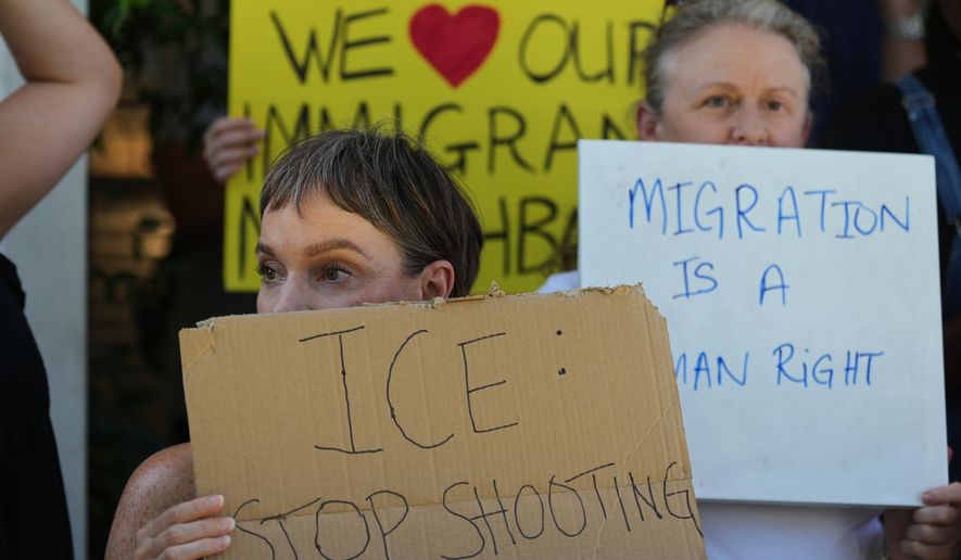 Supporters gather around a news conference for Wilber Rafael Garces Perez, a Venezuelan man shot by an ICE officer, at the offices of attorney Kate Lincoln-Goldfinch, in Austin, Texas, Monday, Sept. 21, 2026. (AP Photo/Eric Gay)