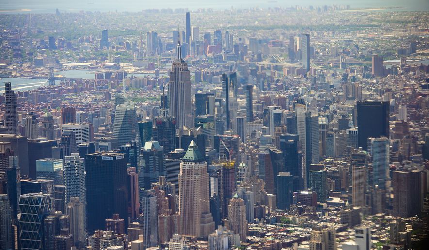 Skyscrapers tower over Manhattan on June 9, 2026, in New York City. (AP Photo/Kelly Marsh, File)