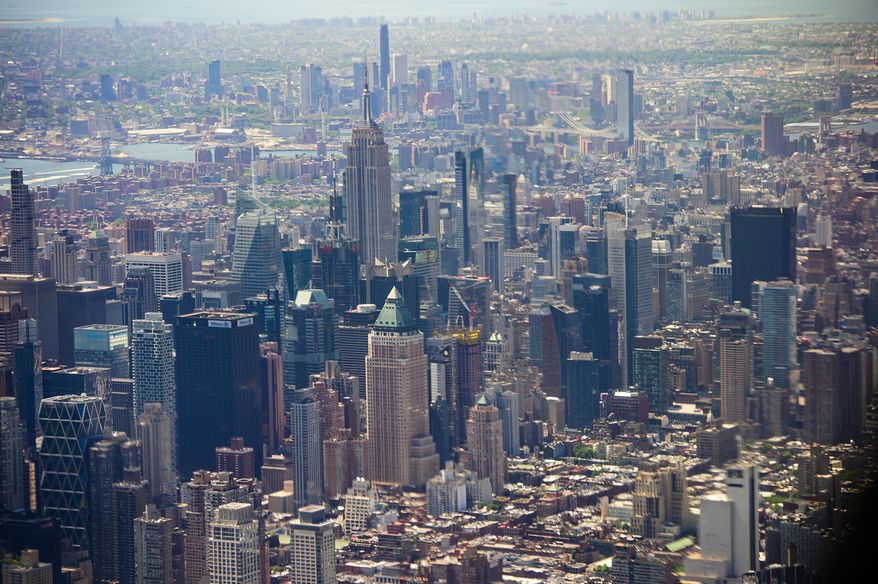 Skyscrapers tower over Manhattan on June 9, 2026, in New York City. (AP Photo/Kelly Marsh, File)