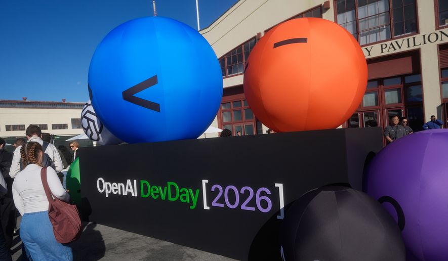 Visitors arrive for the OpenAI DevDay 2026 conference, Tuesday, Sept. 29, 2026, in San Francisco. (AP Photo/Jeff Chiu) ** FILE **