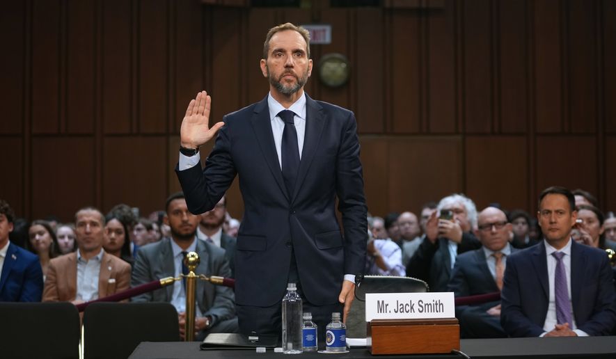 Former Justice Department special counsel Jack Smith is sworn in before he testifies before the Senate Judiciary Committee at the Capitol, Sunday, Sept. 29, 2026, in Washington. (AP Photo/Allison Robbert)