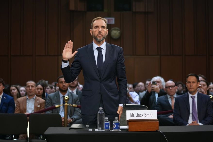 Former Justice Department special counsel Jack Smith is sworn in before he testifies before the Senate Judiciary Committee at the Capitol, Sunday, Sept. 29, 2026, in Washington. (AP Photo/Allison Robbert)