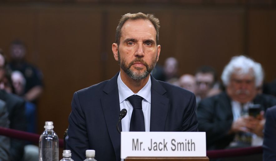 Former Justice Department special counsel Jack Smith is seated before he testifies before the Senate Judiciary Committee at the U.S. Capitol on Tuesday, Sept. 29, 2026, in Washington. (AP Photo/Allison Robbert)